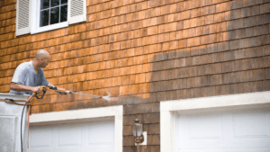 Professional power washing and pressure washing services cleaning house shingles
